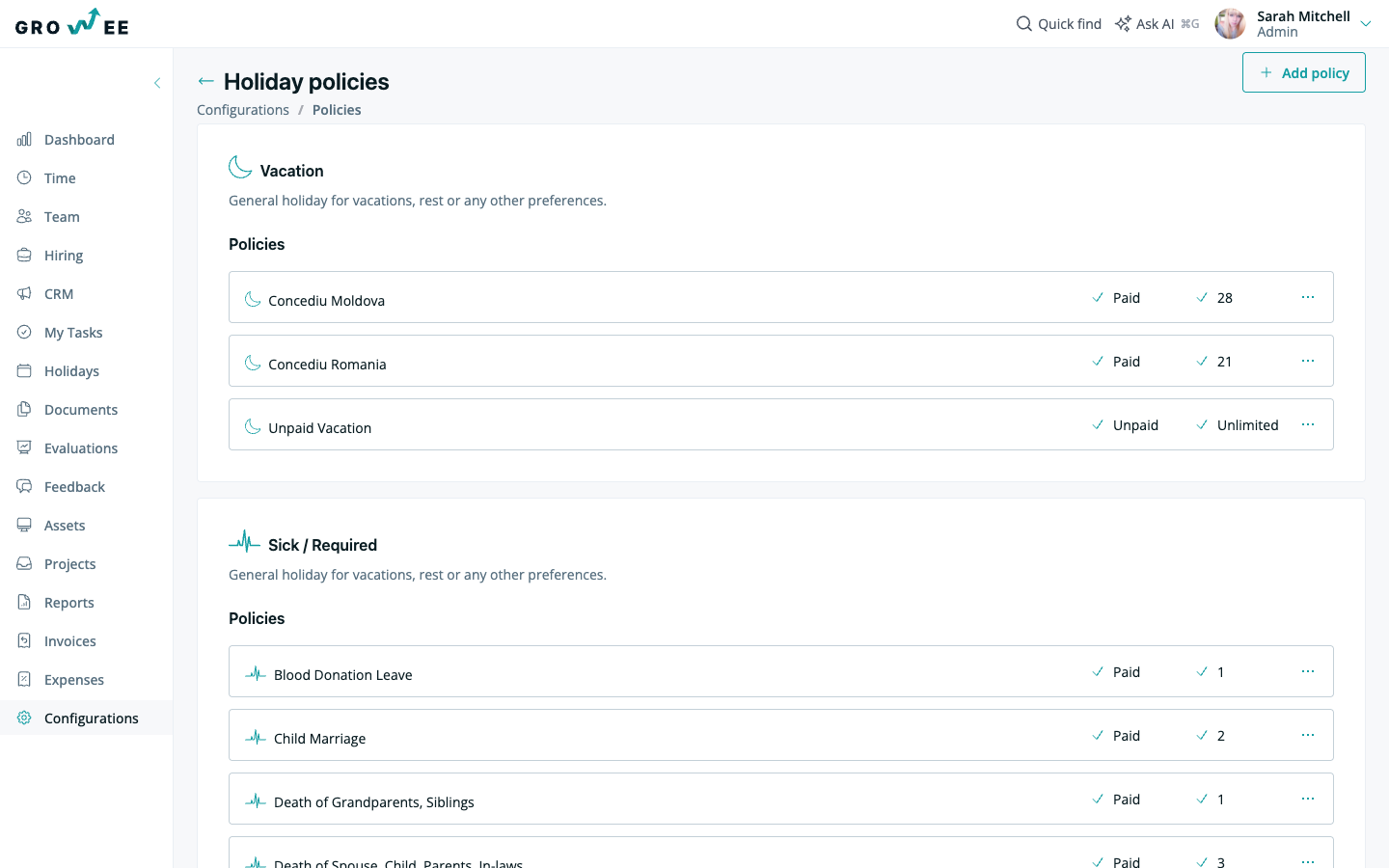 Holiday policies page grouped by type, each policy showing a paid or unpaid badge and its day count